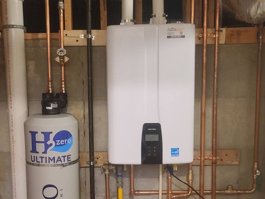 Tankless water heater installed in a home by Alliance Plumbing & Service Group